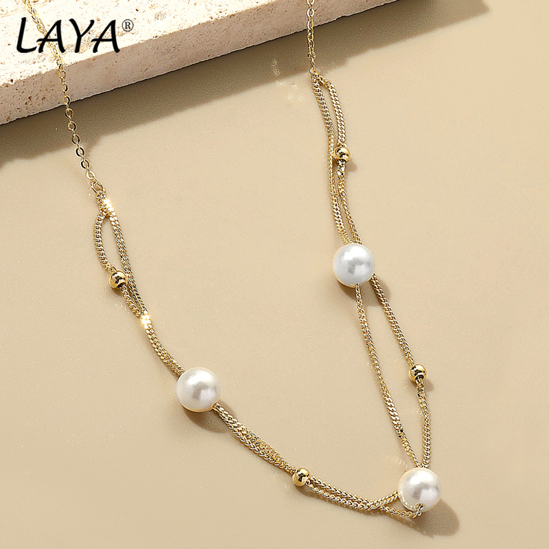 LAYA Minimalist Shell Pearl Mu - Freshwater Line avis et prix