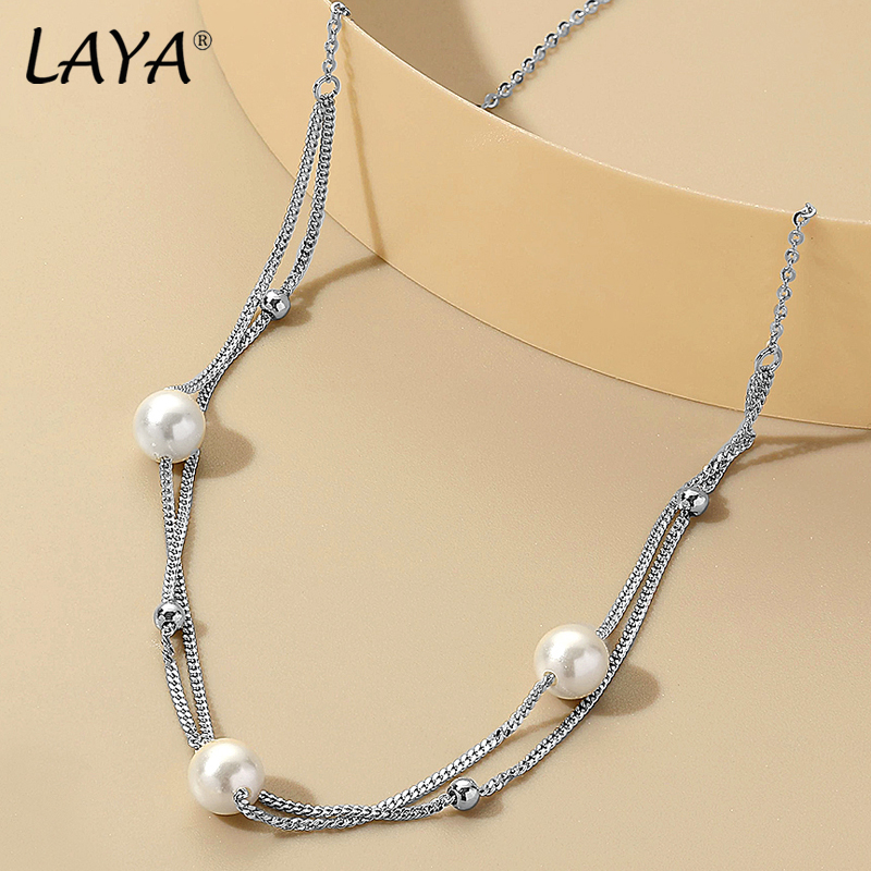 LAYA Minimalist Shell Pearl Mu - Freshwater Line avis et prix